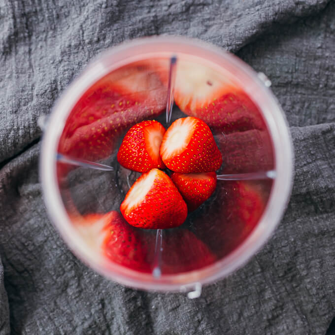 fresh strawberries in blender cup